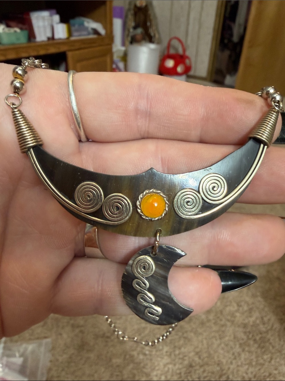 Handcrafted Black and Gold Crescent Pendant Necklace with Orange Accent